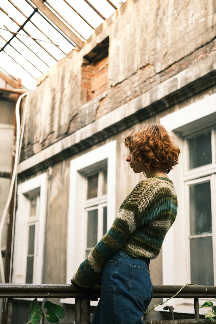 Woman Holding On Guardrail