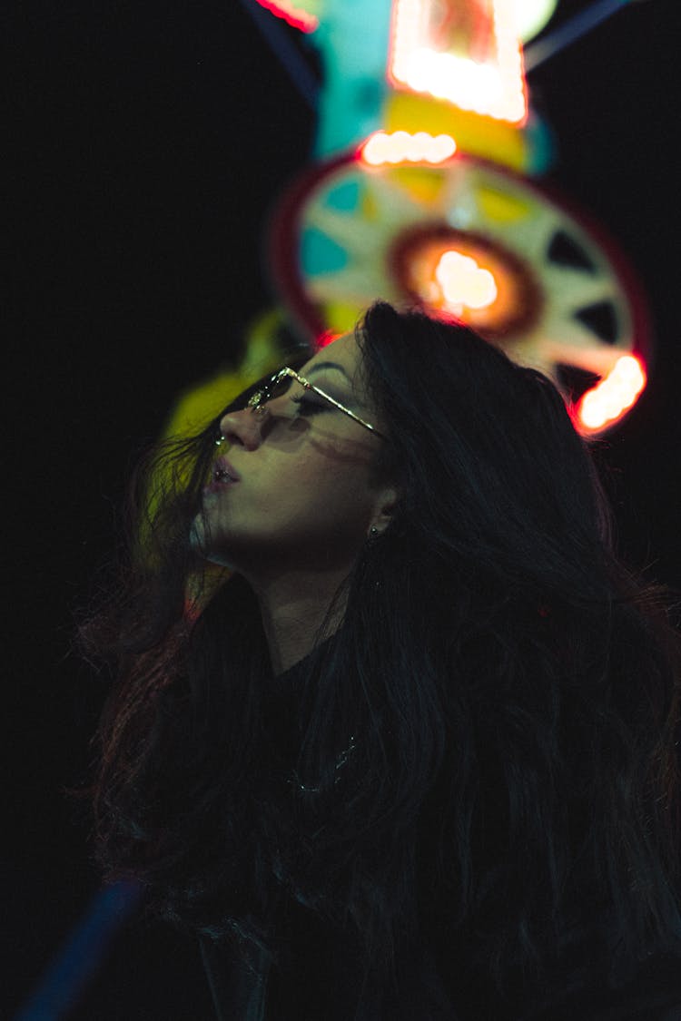 Woman In Sunglasses At Night Festival