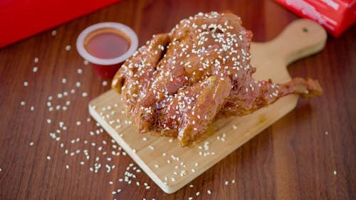 Whole Fried Chicken with Honey and Sesame Seeds