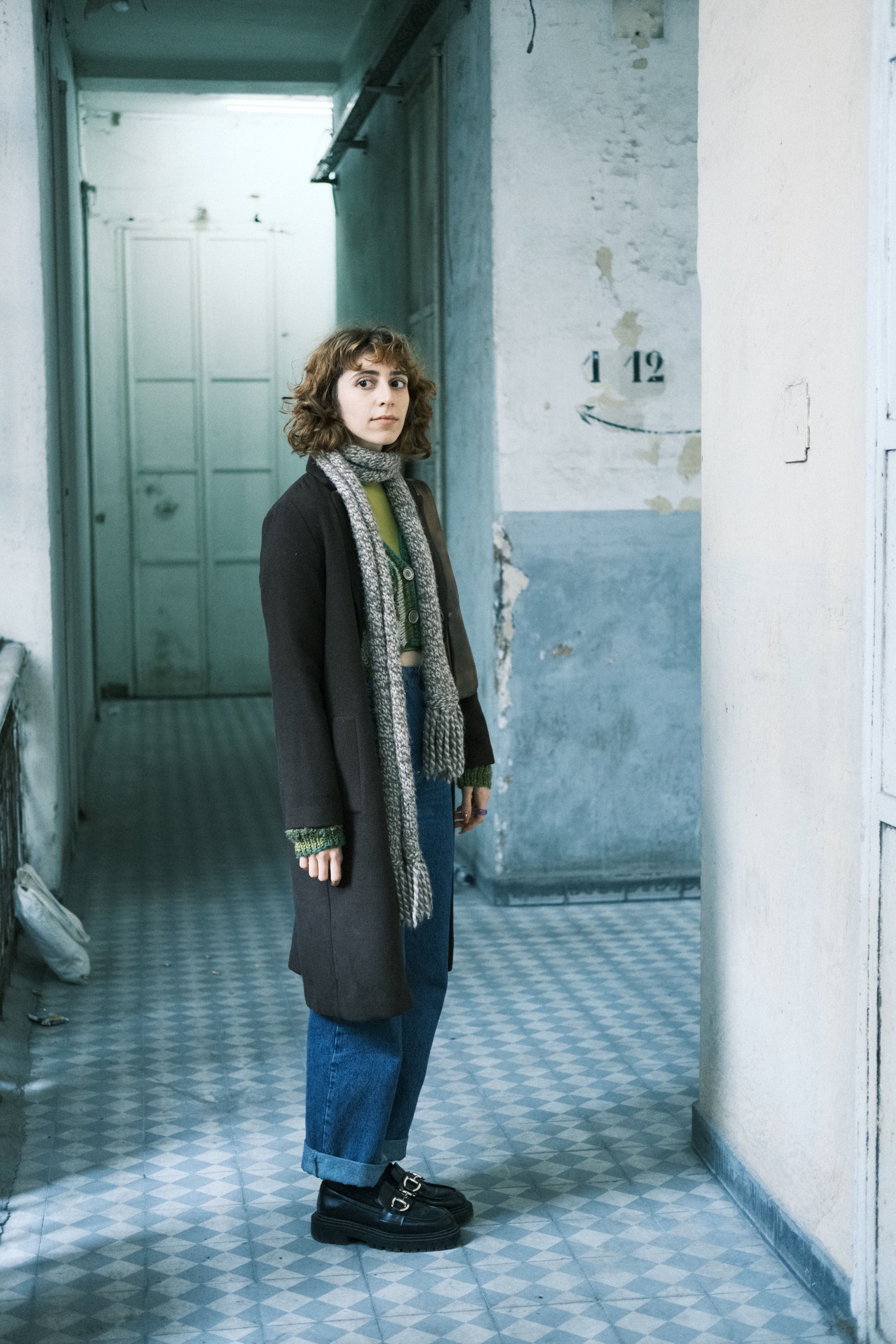 Woman Standing in Hallway · Free Stock Photo