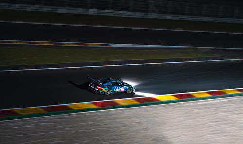 Free High-speed racing car at night on Spa Francorchamps track, Belgium. Stock Photo