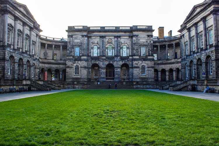 Grass Field In Front Of A Building