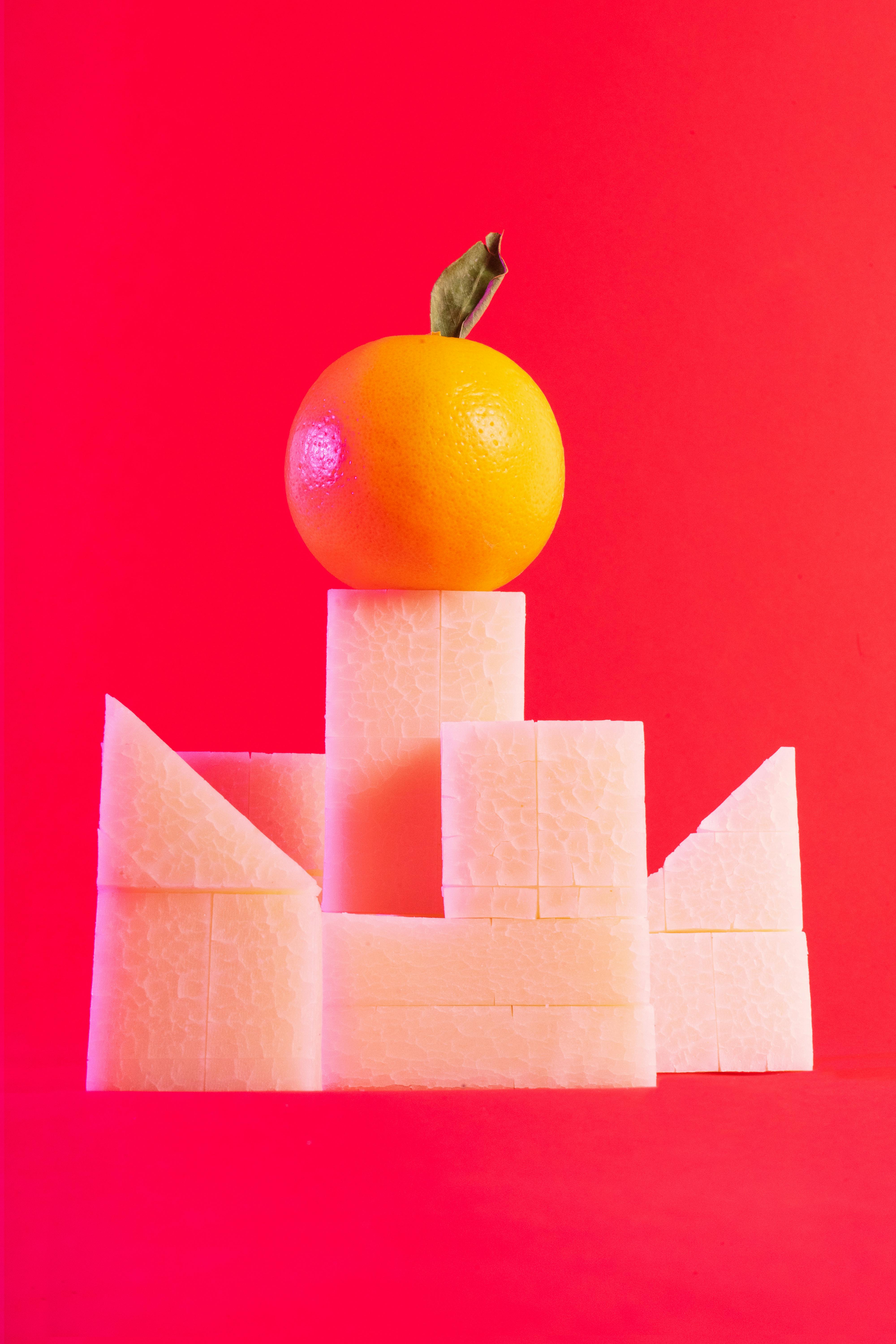 orange on a stack of sugar cubes
