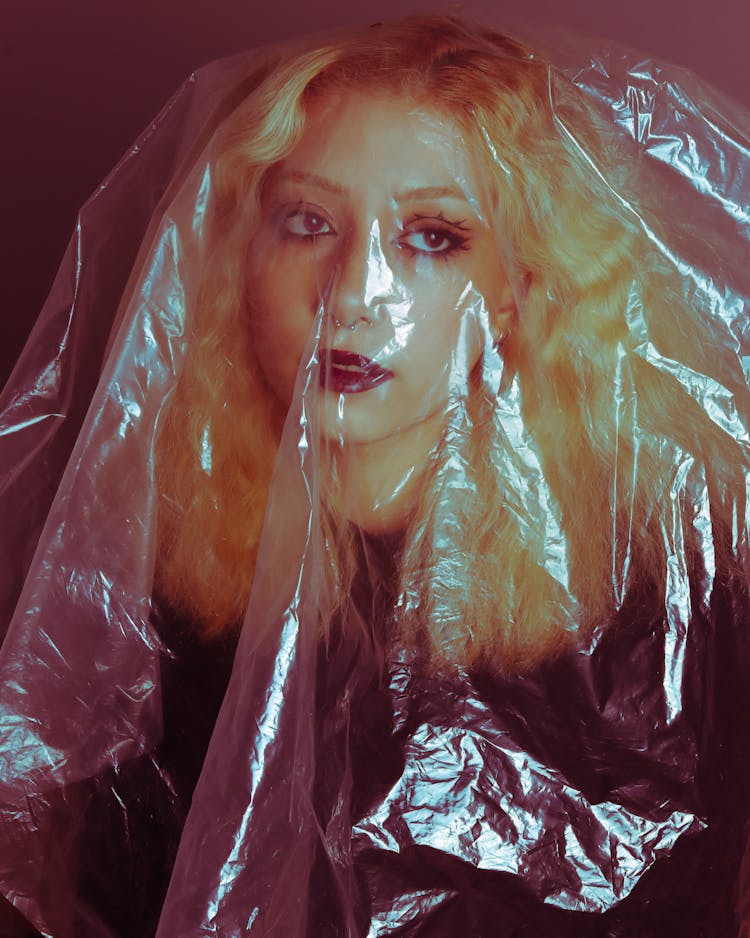 Blonde Woman Model Covered With Transparent Foil