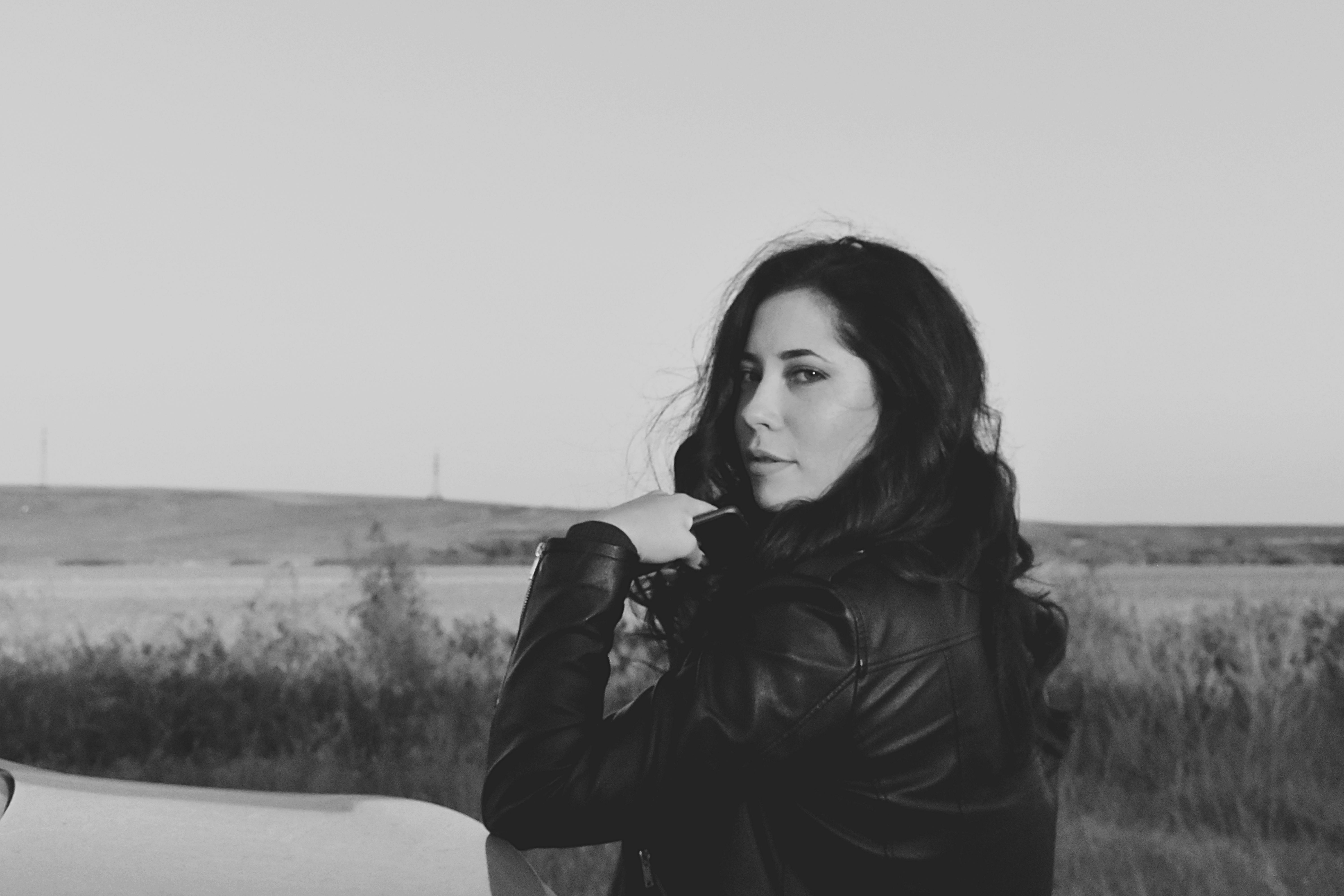 Woman Wearing Jacket Grayscale Photo · Free Stock Photo