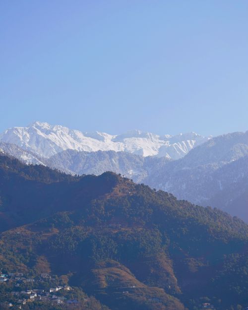 Free Stunning view of Himachal Pradesh's snow-capped mountains under a clear blue sky. Stock Photo