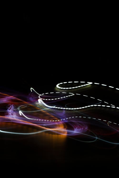 Blurred Abstract Light Lines on Black Background 
