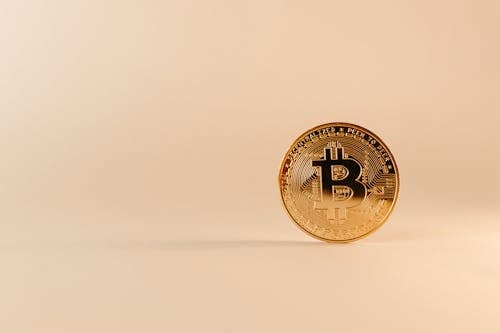 Bitcoin on White Surface