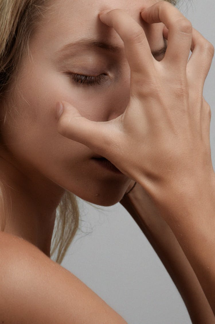 Close Up Photo Of Face Of An Emotional Woman