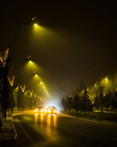 Immagine gratuita di auto, illuminato, lampioni