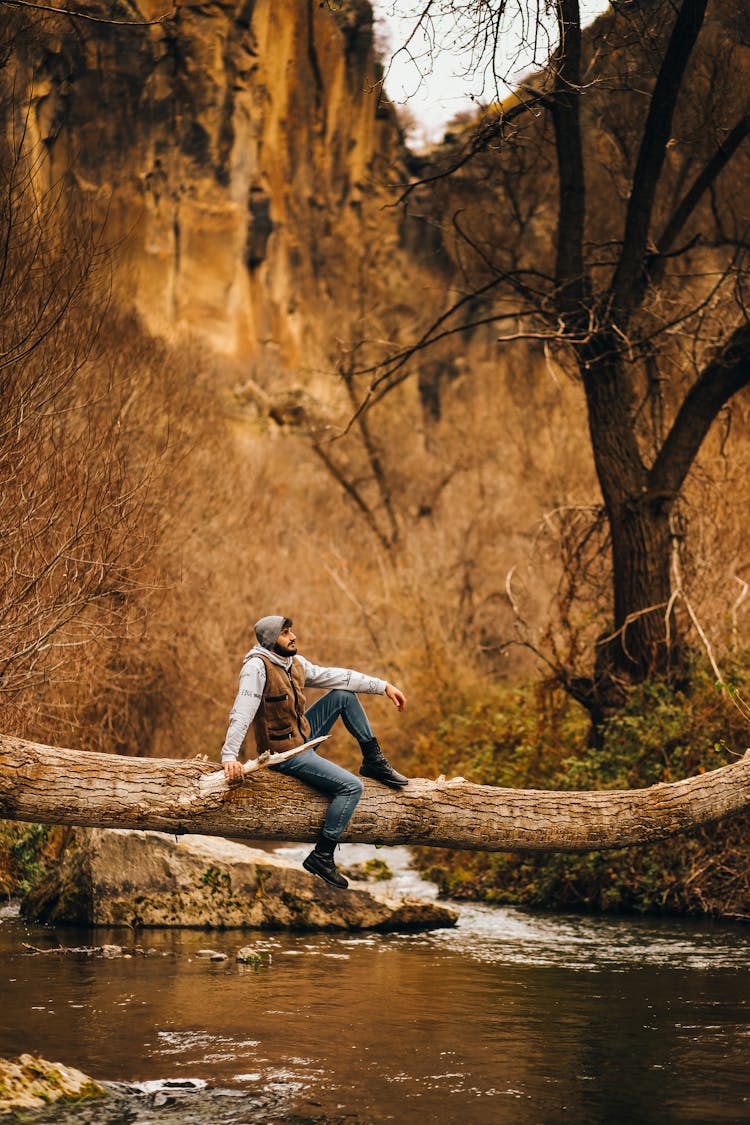 Fashion Man Posing In Leisure Clothing In Mountain Scenery