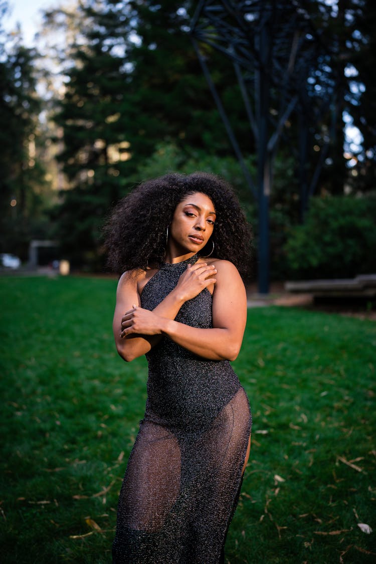 Woman Wearing Elegant Dress In Park