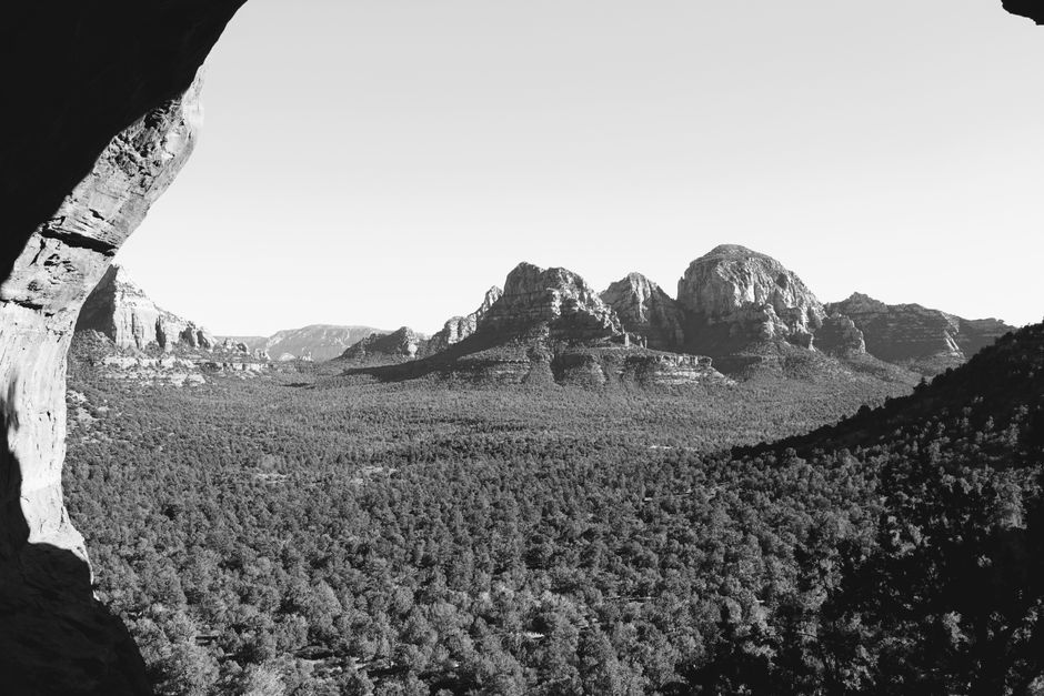 Unbeatable Secret Wilderness Sedona Helicopter Sunset Tour Review: The Ultimate Guide to Sedona's Most Breathtaking Aerial Experience Review 2026 - A breathtaking black and white view of the Sedona mountains and forest.
