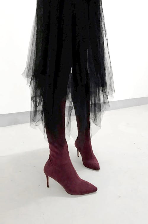 Photo of Person wearing Burgundy High Heels