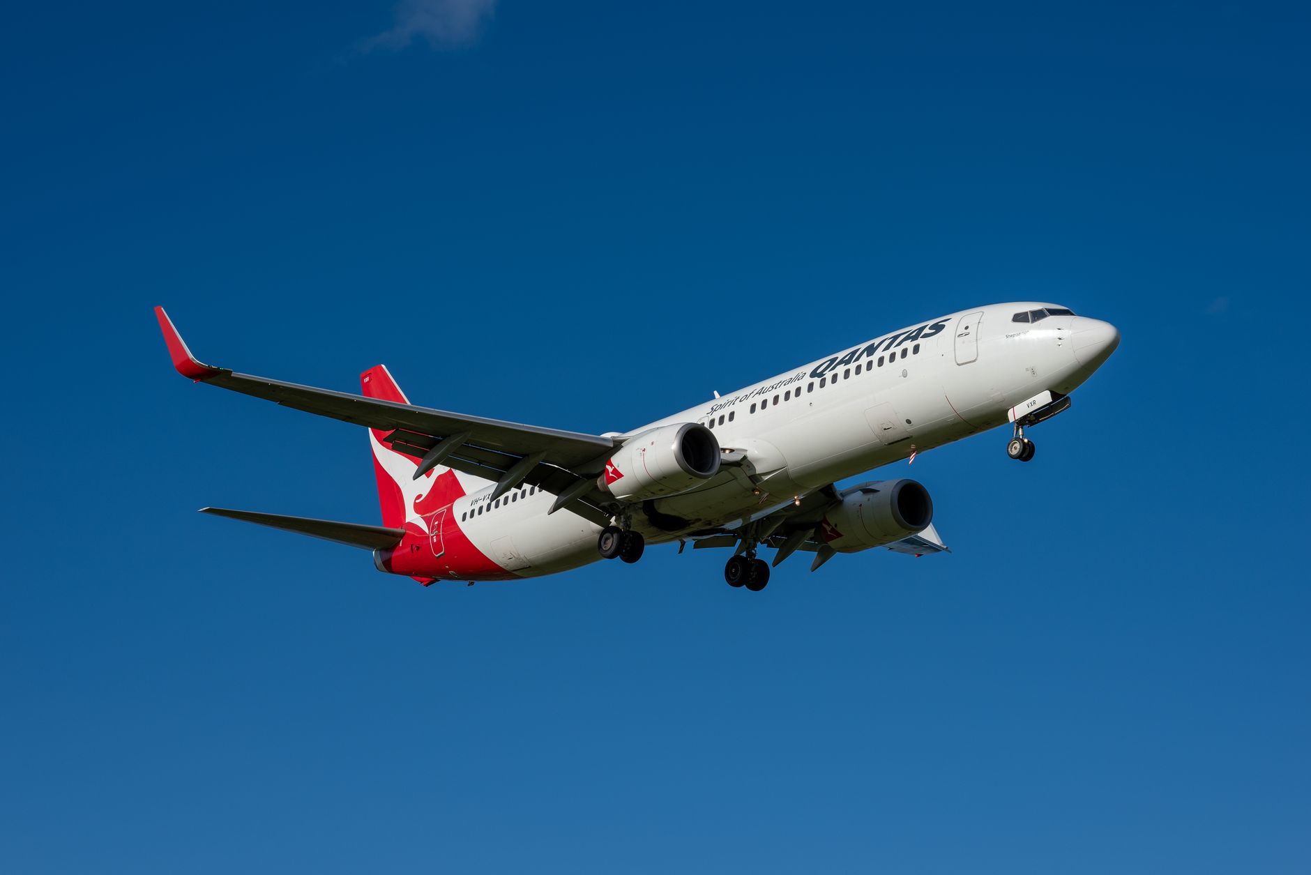 Qantas flight diverted after engine flames seen by passengers