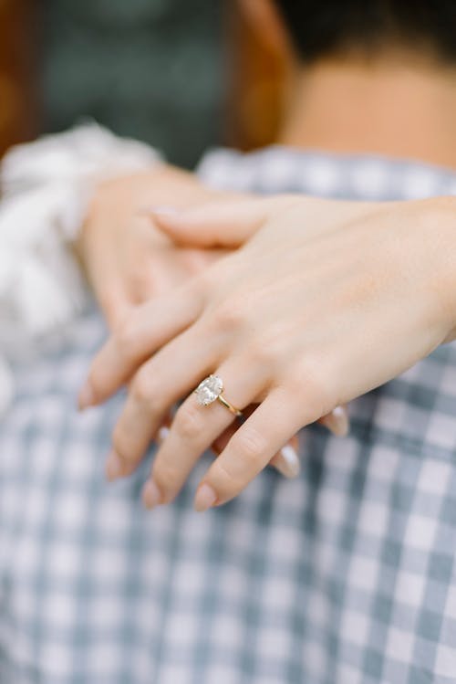 A Person Wearing an Engagement Ring 