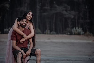 Lesbian couple discussing pregnancy carrying decision
