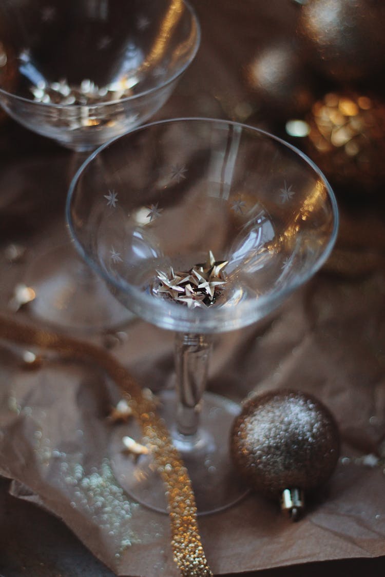 Champagne Glasses Decorated With Gold Confetti