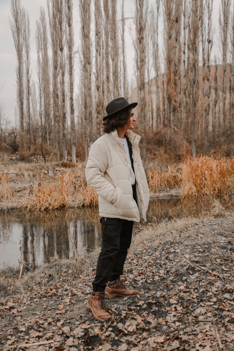 A Man In A White Jacket Looking Away