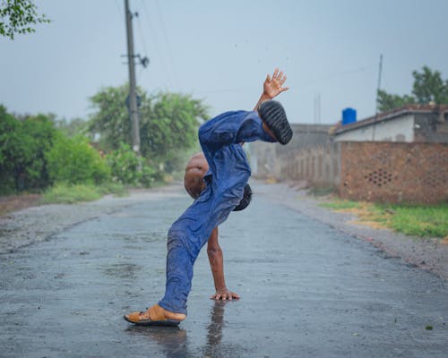 Man Dancing in the Rain