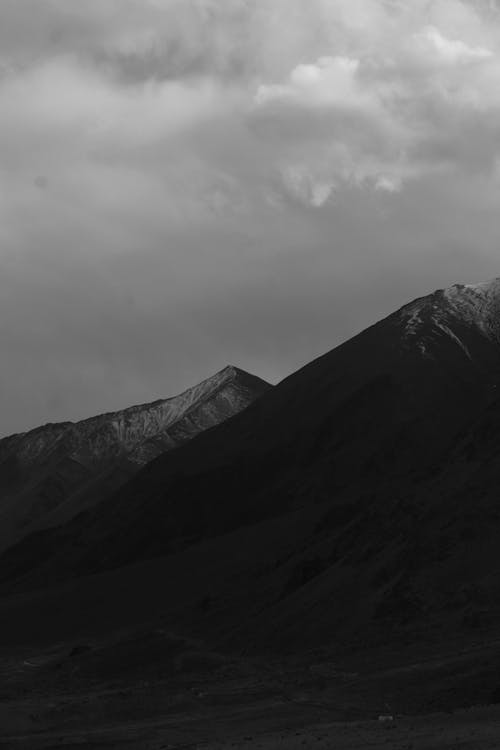 Foto profissional grátis de cadeia de montanhas, com frio, inverno