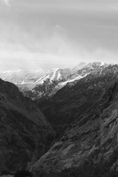 Stunning black and white view of a snowcapped mountain range, capturing nature's grandeur.