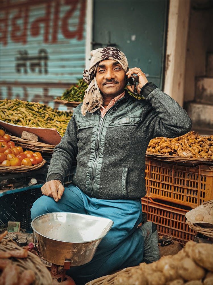  Vegetable Vendor Using Cellphone