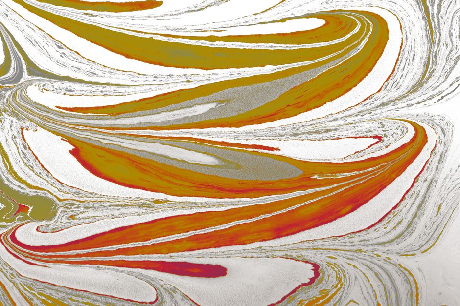 Dynamic abstract marbling with flowing patterns in bright and earthy tones, perfect for creative backgrounds.