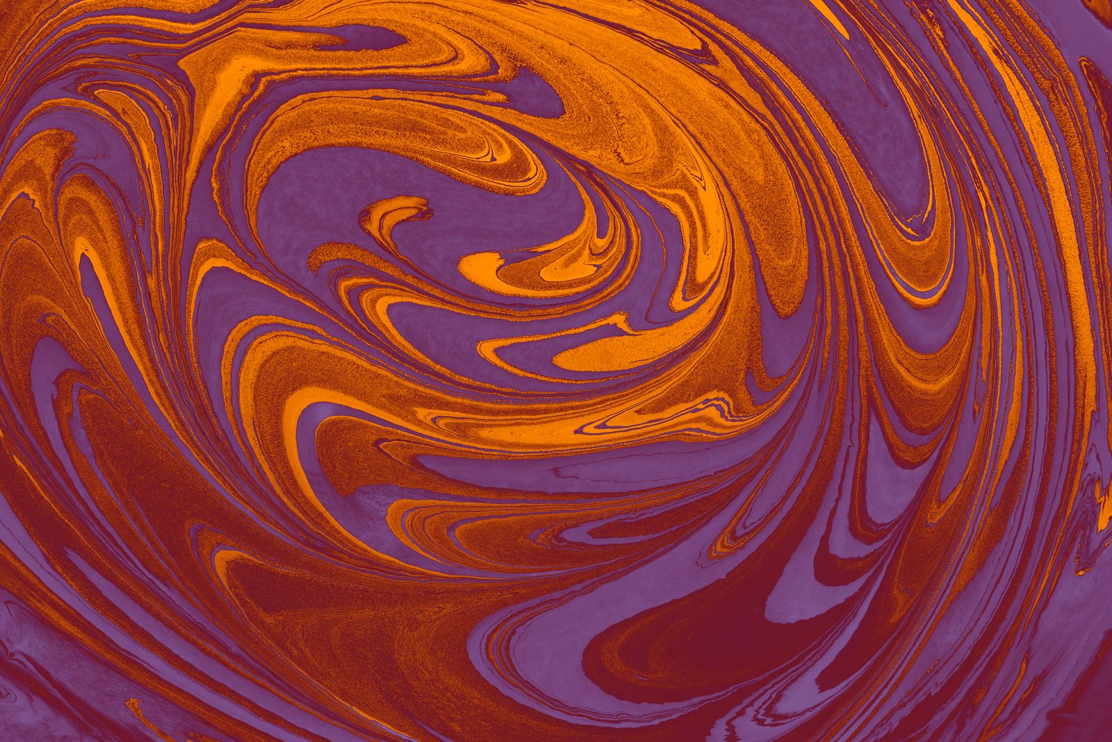 Amber pigment folding through violet — photo by Turgay Koca on Pexels