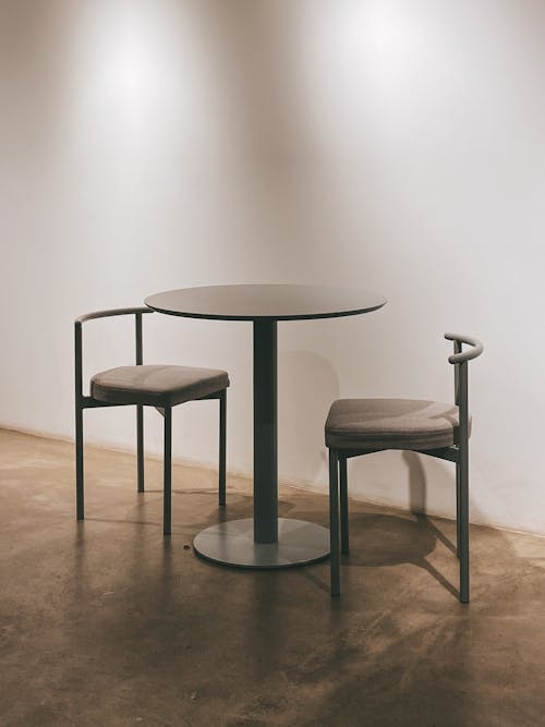 Two Padded Chairs and a Table