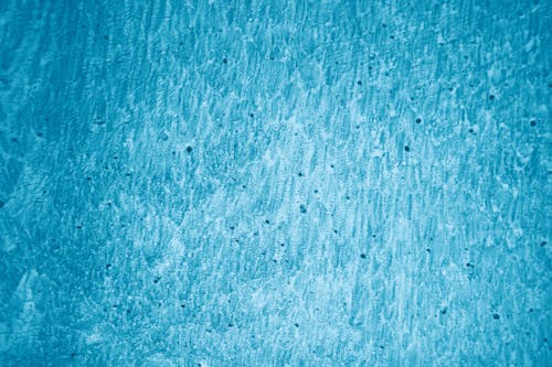 Abstract Texture of Uneven Blue Wall Paint