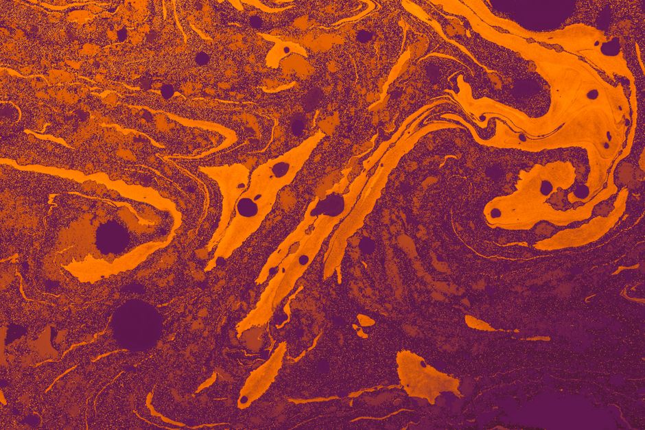 Dynamic orange and purple fluid art with a swirling pattern and rich texture.