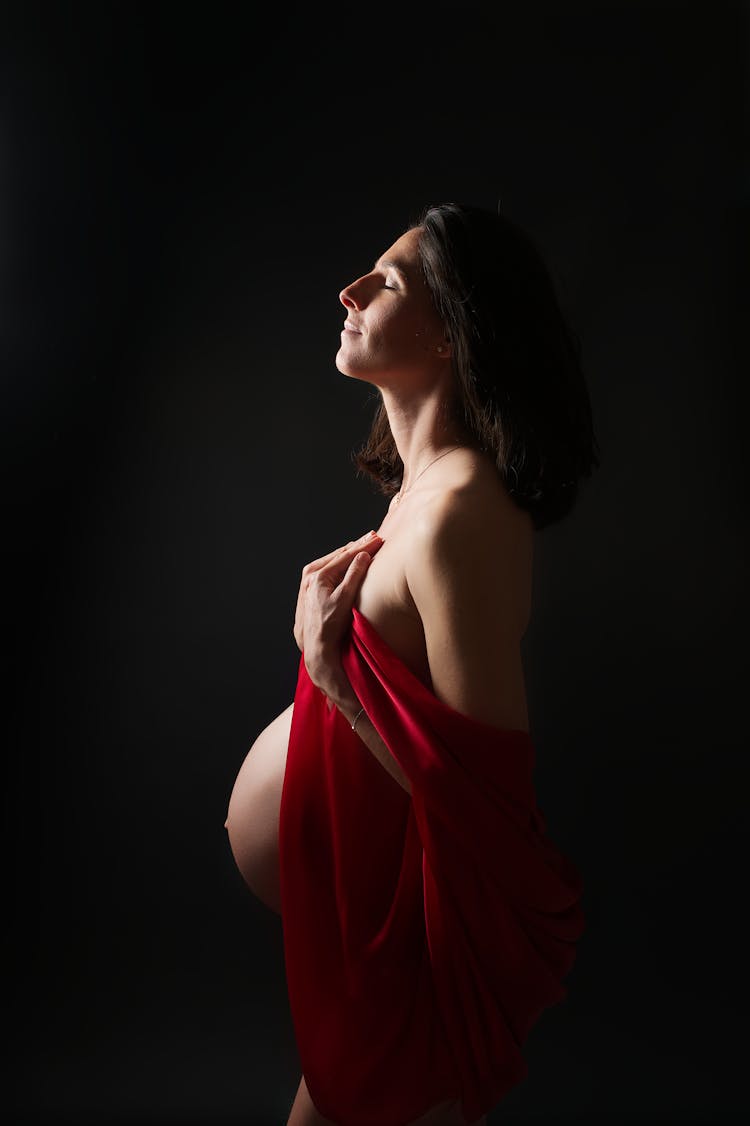 Photo Of A Woman Showing The Pregnancy Belly