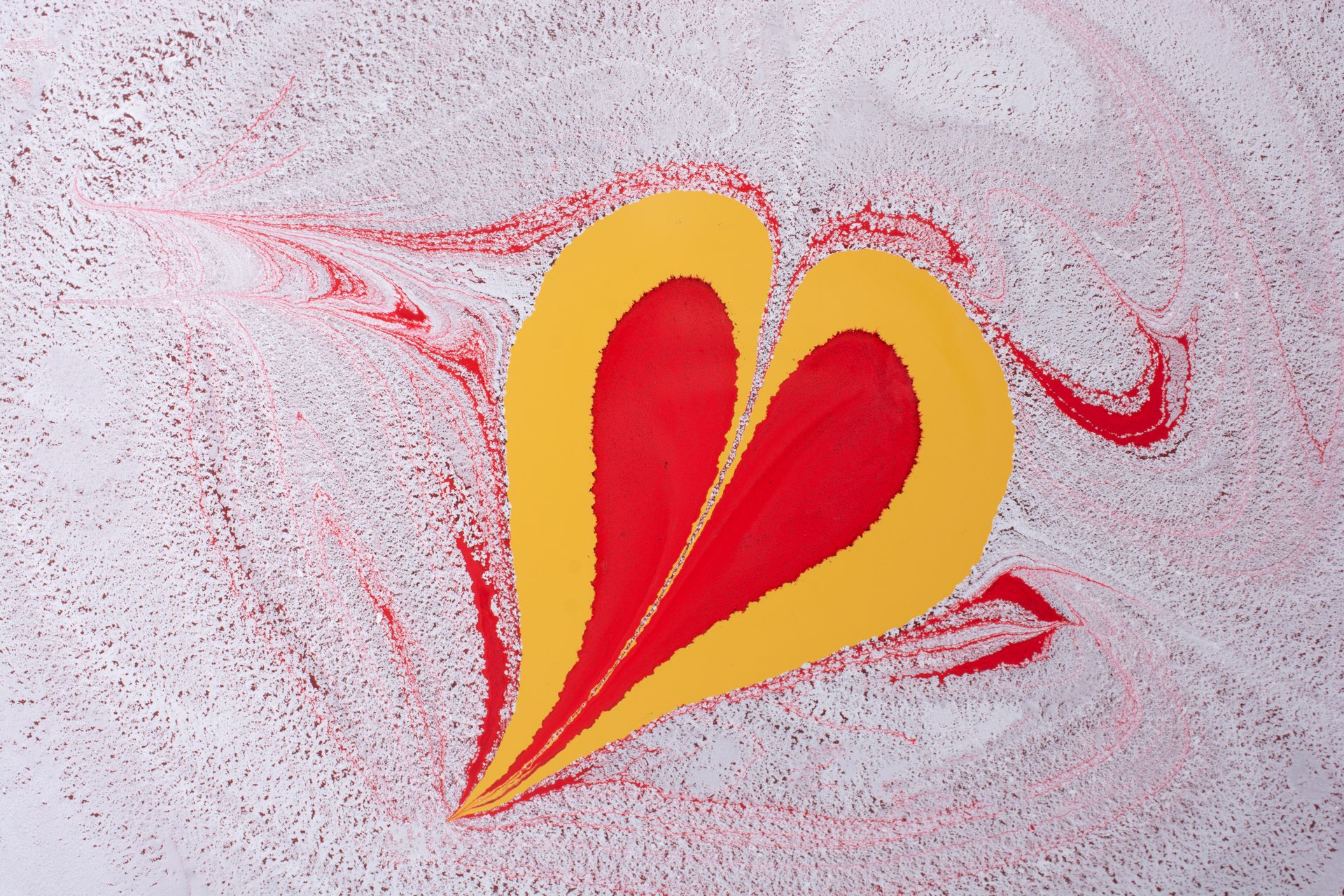 Vibrant abstract painting with a heart shape in red and yellow on a swirling background.