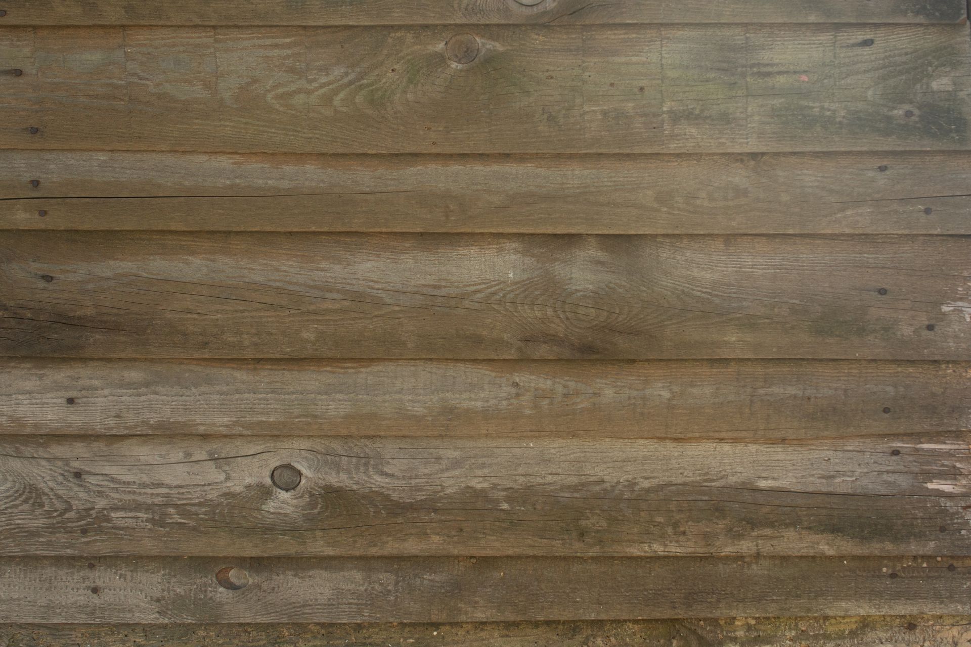 Old wooden panel wall with natural texture, ideal for backgrounds and texturing.