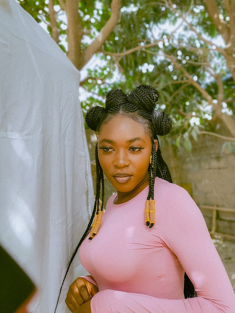 Photo Of A Standing Young Beauty Woman Wearing Pink Shirt