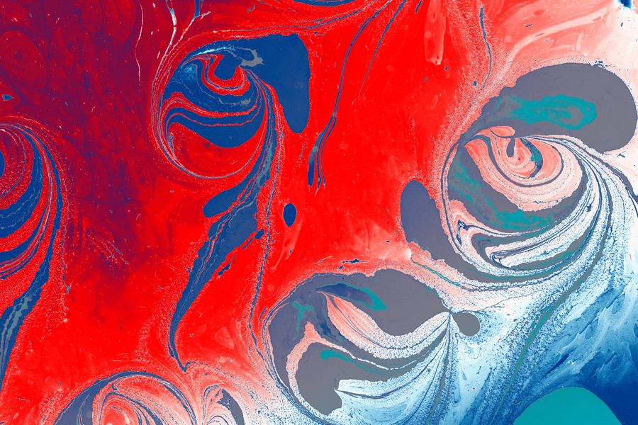 Colorful abstract fluid art showcasing bright swirling patterns and vibrant red and blue shades