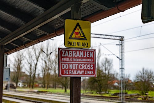 Free Warning Sign in Croatian on Train Station  Stock Photo