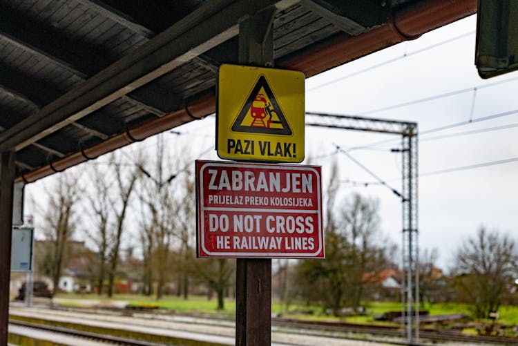 Warning Sign In Croatian On Train Station 