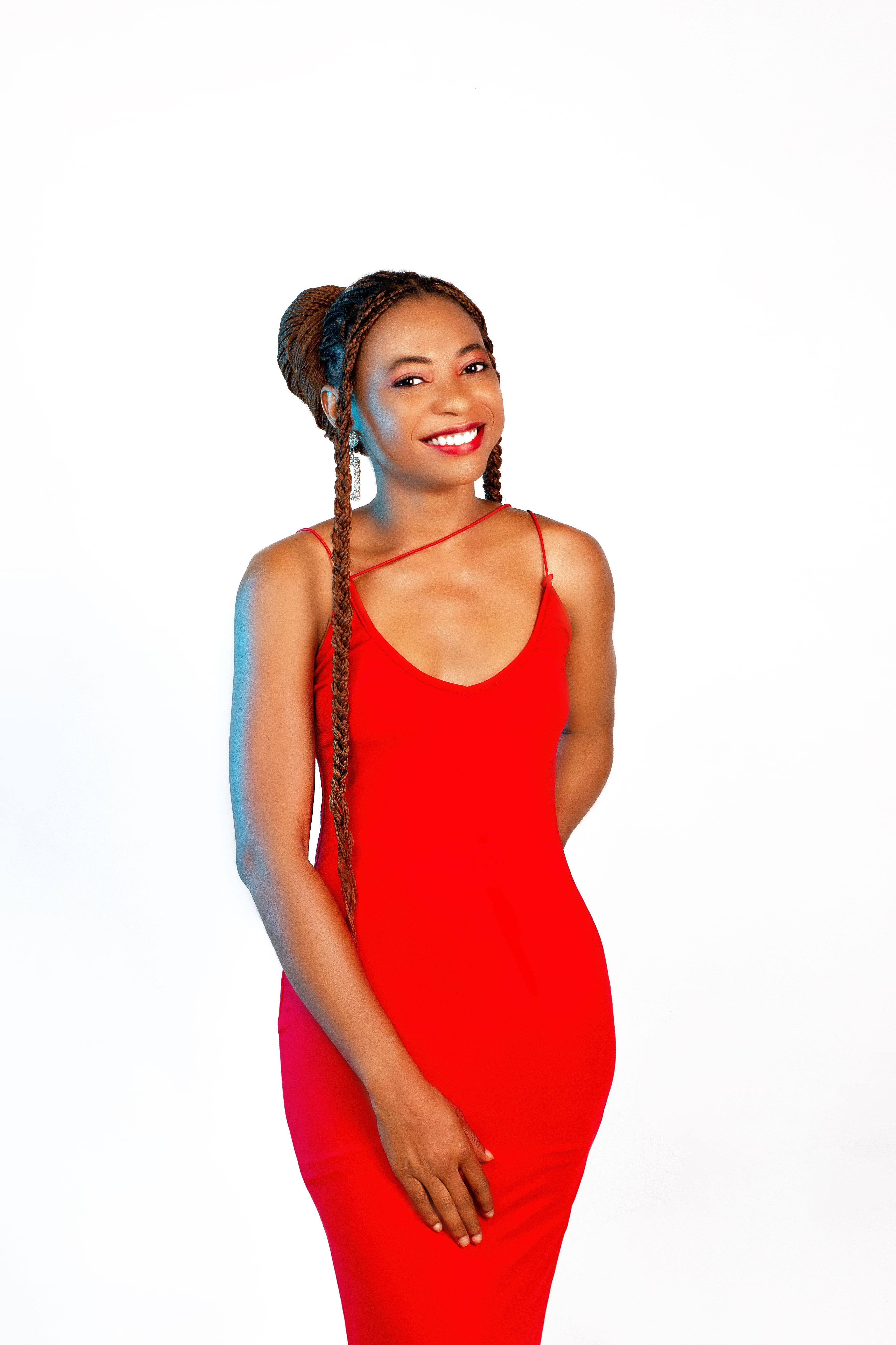 A Woman in a Red Dress Smiling · Free Stock Photo