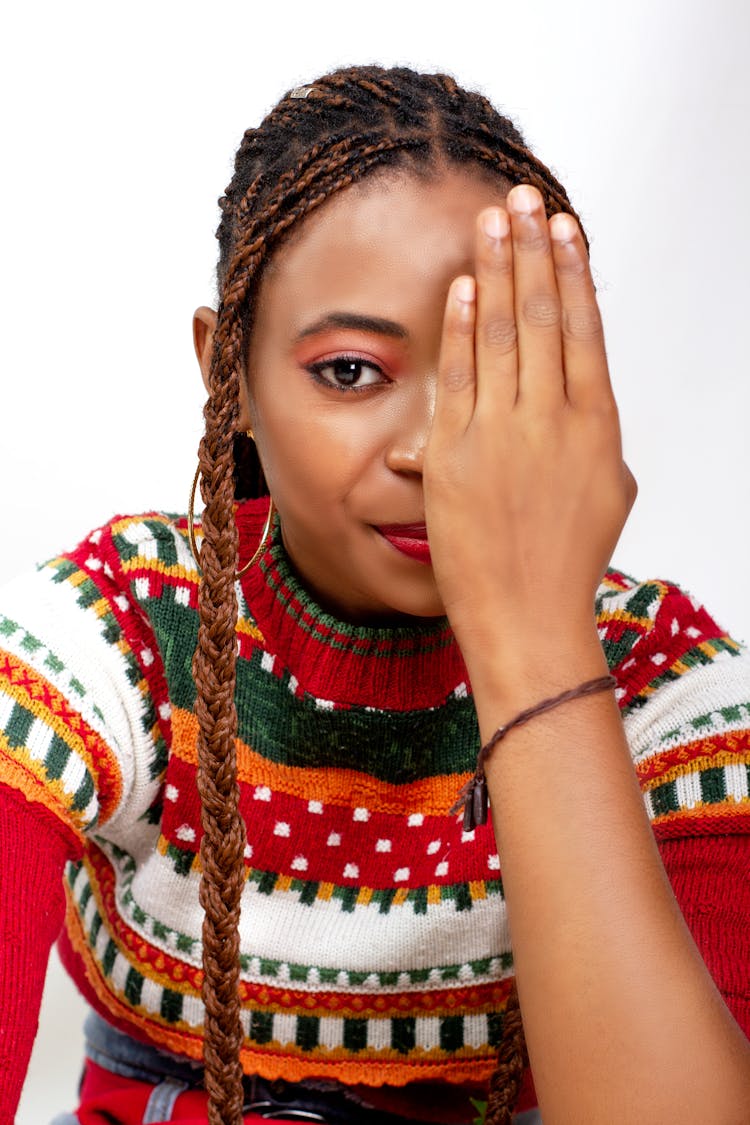 Woman Covering Eye With Hand On White Background