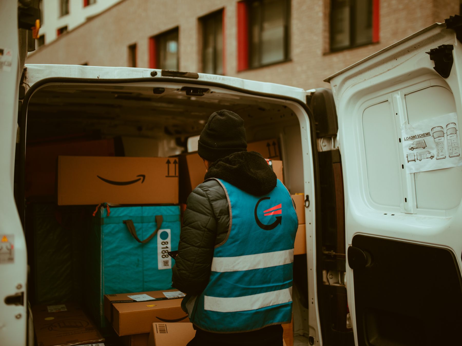 Burley — belongings being loaded for transport to storage