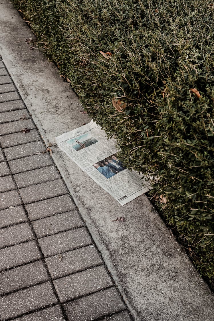 Newspaper On The Ground