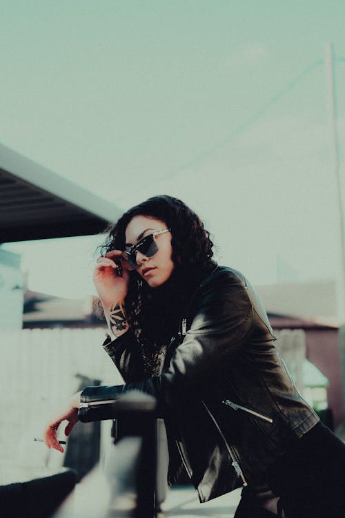 Brunette Woman in Leather Jacket