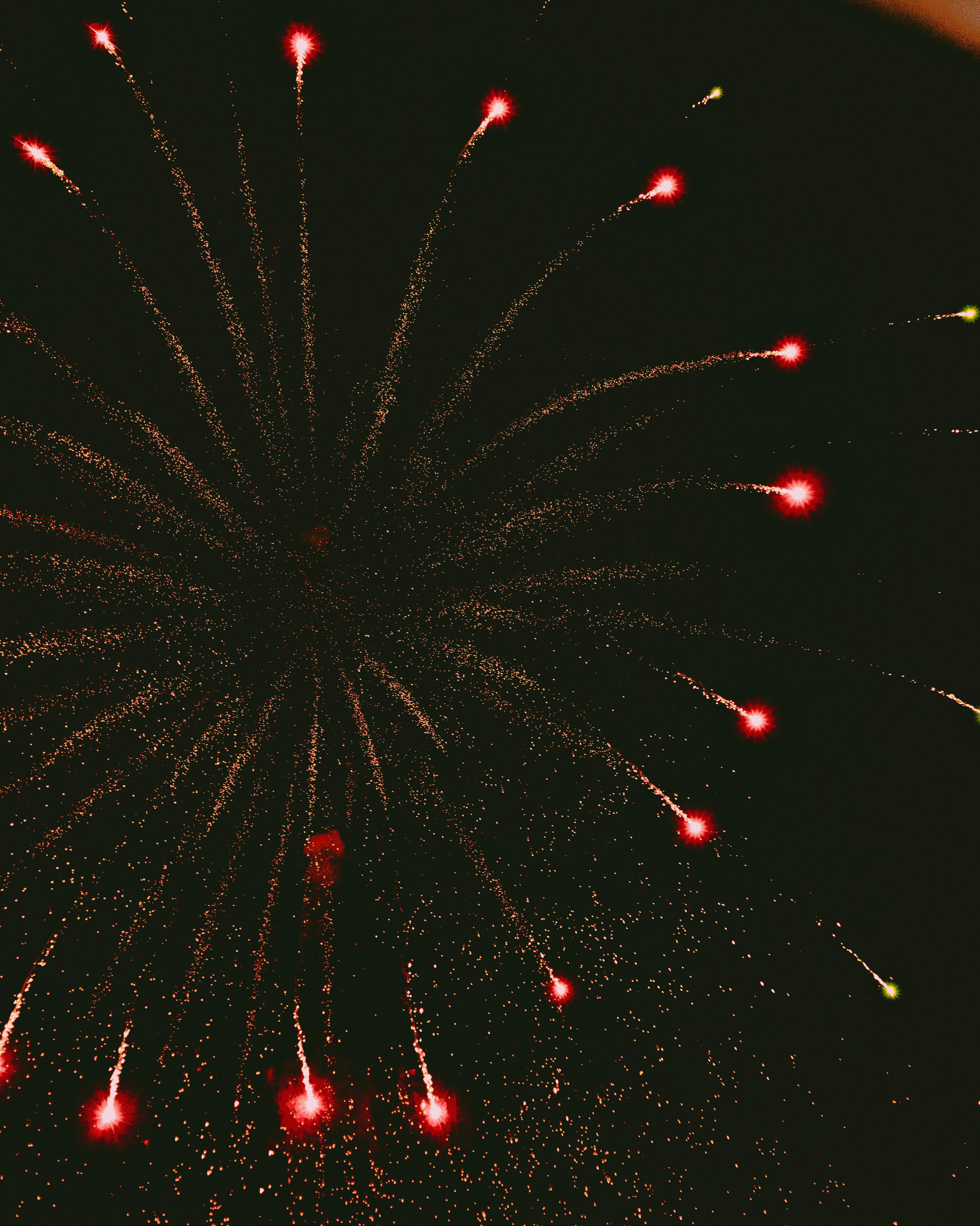 Stunning fireworks explosion captured at night in Puebla, Mexico, showcasing vibrant colors and motion.