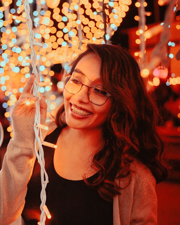 Smiling Brunette Woman at Night