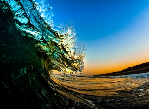 Free Captivating ocean wave captured at sunset in Miyazaki, Japan. Perfect blend of colors and motion. Stock Photo