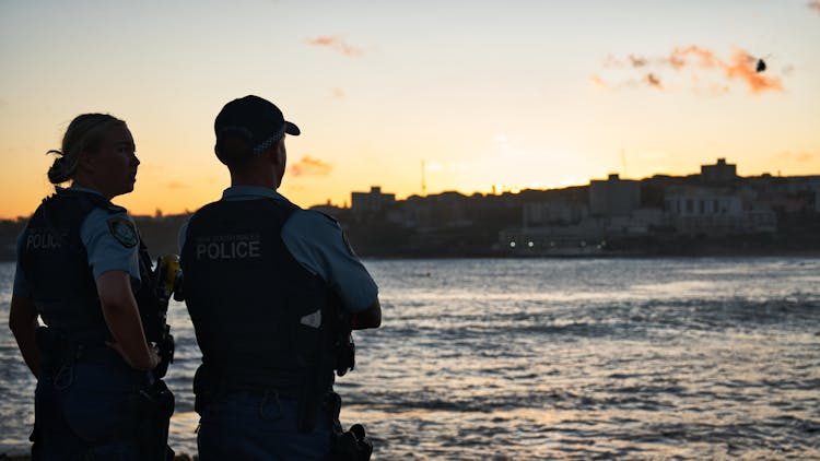 Police Officers Looking At City