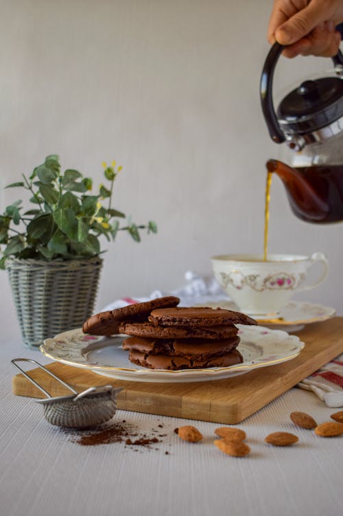 Free Chocolate Pancakes and Coffee on Table Stock Photo