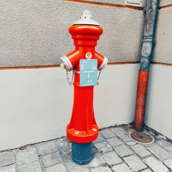 Red fire hydrant representing fire protection and emergency reserve water